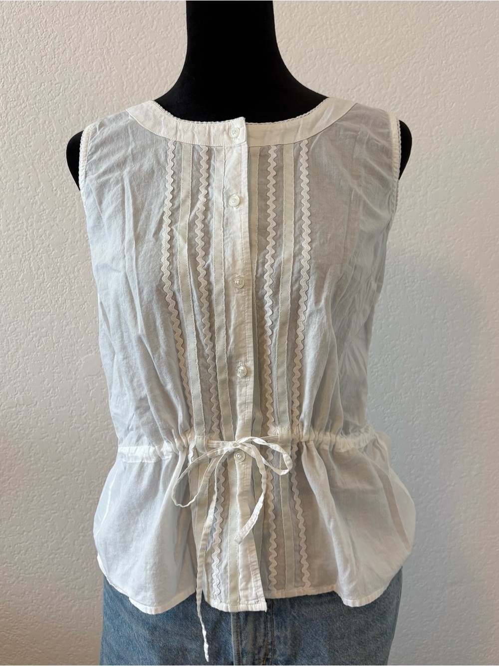 Classic White Sleeveless Button-Front Peplum Top